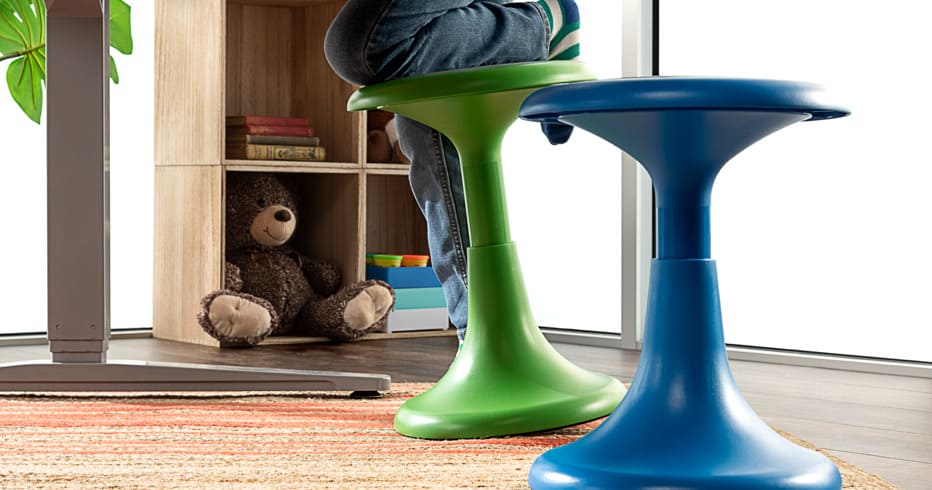 Two children using Kids Active Stools by UPLIFT Desk